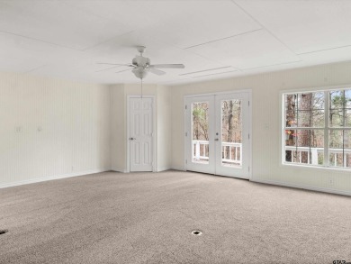 **Owner financing possible with certain terms**  Welcome to this on Holly Lake Ranch Golf Club in Texas - for sale on GolfHomes.com, golf home, golf lot