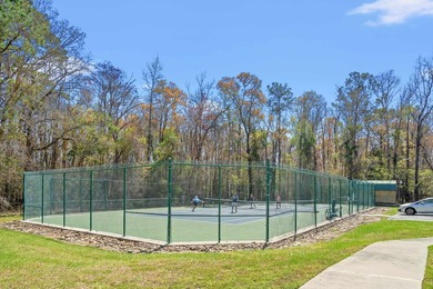 A private wooded setting and buffered golf course views of the on  in South Carolina - for sale on GolfHomes.com, golf home, golf lot
