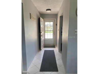STUNNING VIEW! Perfect location to enjoy this 2 bed 2 bath on Seven Springs Golf and Country Club in Florida - for sale on GolfHomes.com, golf home, golf lot