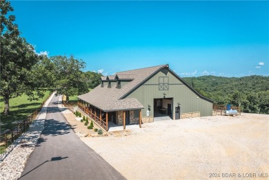 A 263-acre waterfront property with a three-slip dock, located on Bayview Golf Course in Missouri - for sale on GolfHomes.com, golf home, golf lot