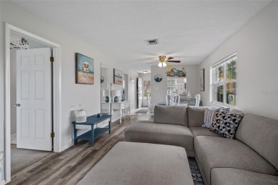 STUNNING VIEW! Perfect location to enjoy this 2 bed 2 bath on Seven Springs Golf and Country Club in Florida - for sale on GolfHomes.com, golf home, golf lot