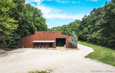 A 263-acre waterfront property with a three-slip dock, located on Bayview Golf Course in Missouri - for sale on GolfHomes.com, golf home, golf lot