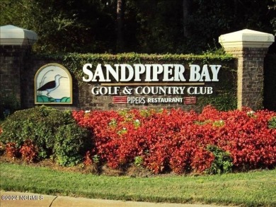 Don't miss the opportunity to move into one of the most on Sandpiper Bay Golf and Country Club in North Carolina - for sale on GolfHomes.com, golf home, golf lot