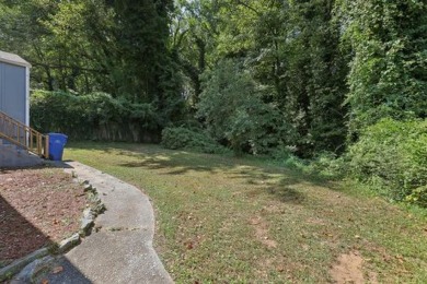 Discover all the charm of 1626 Kenmore Street SW, a beautifully on John A. White Golf Course in Georgia - for sale on GolfHomes.com, golf home, golf lot