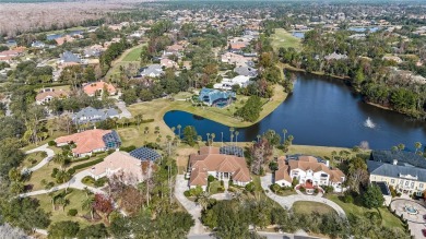 Under contract-accepting backup offers. Elegant Estate in on The Legacy Club At Alaqua Lakes in Florida - for sale on GolfHomes.com, golf home, golf lot