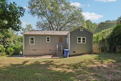 Discover all the charm of 1626 Kenmore Street SW, a beautifully on John A. White Golf Course in Georgia - for sale on GolfHomes.com, golf home, golf lot