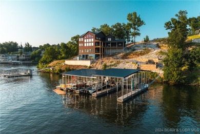 A 263-acre waterfront property with a three-slip dock, located on Bayview Golf Course in Missouri - for sale on GolfHomes.com, golf home, golf lot