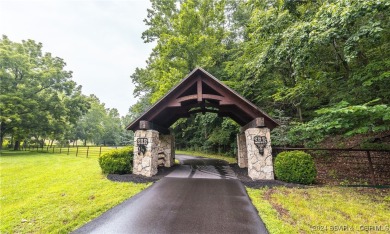 A 263-acre waterfront property with a three-slip dock, located on Bayview Golf Course in Missouri - for sale on GolfHomes.com, golf home, golf lot