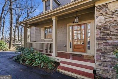 At 2,600-foot elevation, this stunning Craftsman-style retreat on Big Canoe Golf Club - Cherokee in Georgia - for sale on GolfHomes.com, golf home, golf lot