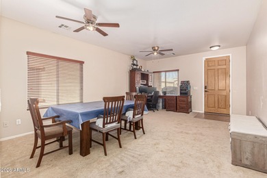 This spacious 3-bedroom, 2.5-bath home offers 2,440 sqft of on The Golf Club At Johnson Ranch in Arizona - for sale on GolfHomes.com, golf home, golf lot