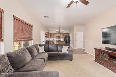 This spacious 3-bedroom, 2.5-bath home offers 2,440 sqft of on The Golf Club At Johnson Ranch in Arizona - for sale on GolfHomes.com, golf home, golf lot