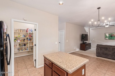 This spacious 3-bedroom, 2.5-bath home offers 2,440 sqft of on The Golf Club At Johnson Ranch in Arizona - for sale on GolfHomes.com, golf home, golf lot