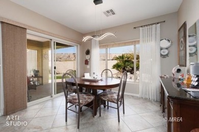 Stone facade adds aesthetic appeal to this 2-BR home plus den on Conestoga Golf Club in Nevada - for sale on GolfHomes.com, golf home, golf lot