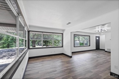Charming and fully renovated... This cozy 3-bedroom, 1-bath home on Osceola Municipal Golf Course in Florida - for sale on GolfHomes.com, golf home, golf lot