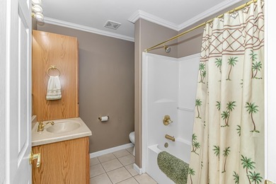 This spacious 3 Bedroom 2 Bath raised beach house is just a very on Prestwick Country Club in South Carolina - for sale on GolfHomes.com, golf home, golf lot