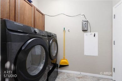 Stone facade adds aesthetic appeal to this 2-BR home plus den on Conestoga Golf Club in Nevada - for sale on GolfHomes.com, golf home, golf lot