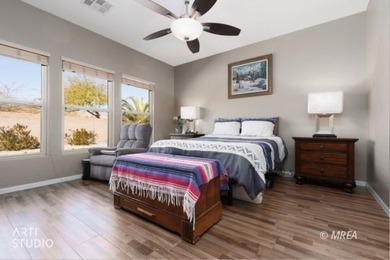 Stone facade adds aesthetic appeal to this 2-BR home plus den on Conestoga Golf Club in Nevada - for sale on GolfHomes.com, golf home, golf lot