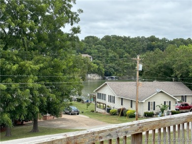 THE VIEWS!! THE SHORES!! SUNNY SLOPE CIRCLE IS THE PLACE TO 
 on Lake Valley Country Club in Missouri - for sale on GolfHomes.com, golf home, golf lot