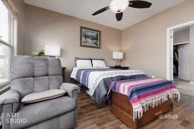 Stone facade adds aesthetic appeal to this 2-BR home plus den on Conestoga Golf Club in Nevada - for sale on GolfHomes.com, golf home, golf lot