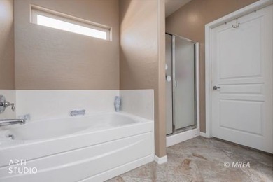 Stone facade adds aesthetic appeal to this 2-BR home plus den on Conestoga Golf Club in Nevada - for sale on GolfHomes.com, golf home, golf lot