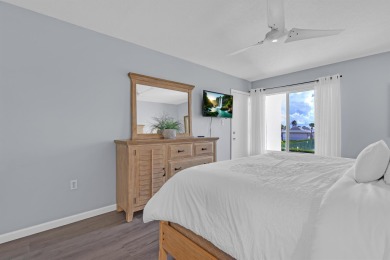 Step into paradise with this beautifully updated 2-bedroom on Ocean Village Golf Course in Florida - for sale on GolfHomes.com, golf home, golf lot