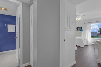 Step into paradise with this beautifully updated 2-bedroom on Ocean Village Golf Course in Florida - for sale on GolfHomes.com, golf home, golf lot