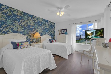 Step into paradise with this beautifully updated 2-bedroom on Ocean Village Golf Course in Florida - for sale on GolfHomes.com, golf home, golf lot