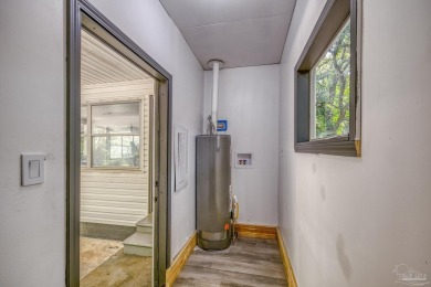 Charming and fully renovated... This cozy 3-bedroom, 1-bath home on Osceola Municipal Golf Course in Florida - for sale on GolfHomes.com, golf home, golf lot
