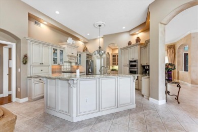 Updated roof, hurricane-impact windows and doors, new AC, water on University Park Country Club in Florida - for sale on GolfHomes.com, golf home, golf lot