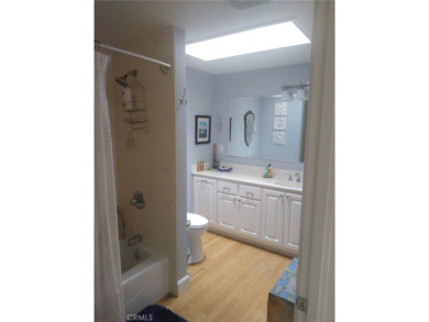 Welcome home to this Leisure World Mutual 11 light and bright 1 on Leisure World Seal Beach Golf Course in California - for sale on GolfHomes.com, golf home, golf lot
