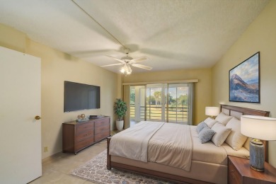 Discover your perfect retreat in this bright corner unit nestled on Poinciana Golf Club in Florida - for sale on GolfHomes.com, golf home, golf lot