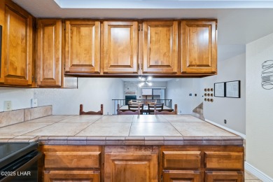 Enjoy panoramic views of the lake, golf course, and surrounding on London Bridge Golf Course in Arizona - for sale on GolfHomes.com, golf home, golf lot
