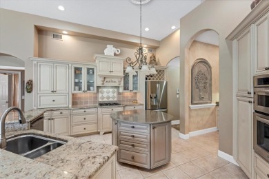 Updated roof, hurricane-impact windows and doors, new AC, water on University Park Country Club in Florida - for sale on GolfHomes.com, golf home, golf lot