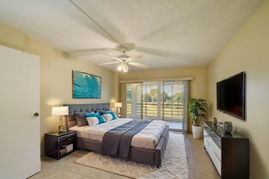 Discover your perfect retreat in this bright corner unit nestled on Poinciana Golf Club in Florida - for sale on GolfHomes.com, golf home, golf lot