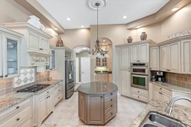 Updated roof, hurricane-impact windows and doors, new AC, water on University Park Country Club in Florida - for sale on GolfHomes.com, golf home, golf lot