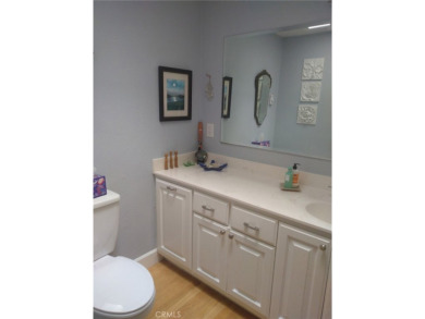 Welcome home to this Leisure World Mutual 11 light and bright 1 on Leisure World Seal Beach Golf Course in California - for sale on GolfHomes.com, golf home, golf lot