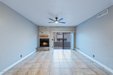 Enjoy panoramic views of the lake, golf course, and surrounding on London Bridge Golf Course in Arizona - for sale on GolfHomes.com, golf home, golf lot