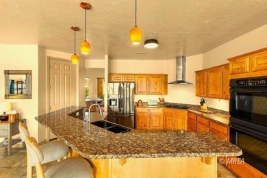 Located on a quiet cul-de-sac, this beautiful 4 bedroom, 3 bath on The Oasis Golf Club in Nevada - for sale on GolfHomes.com, golf home, golf lot