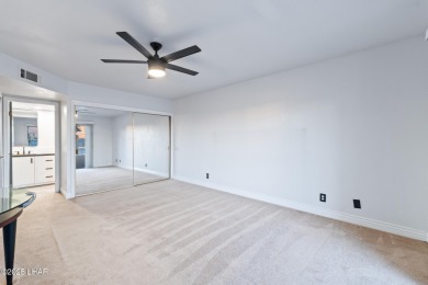 Enjoy panoramic views of the lake, golf course, and surrounding on London Bridge Golf Course in Arizona - for sale on GolfHomes.com, golf home, golf lot