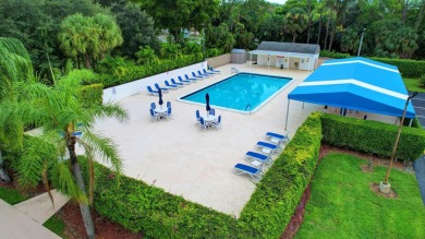 Discover your perfect retreat in this bright corner unit nestled on Poinciana Golf Club in Florida - for sale on GolfHomes.com, golf home, golf lot