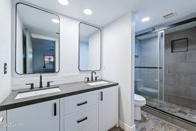 Enjoy panoramic views of the lake, golf course, and surrounding on London Bridge Golf Course in Arizona - for sale on GolfHomes.com, golf home, golf lot