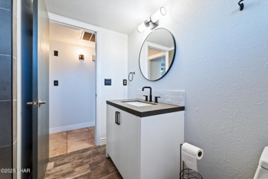 Enjoy panoramic views of the lake, golf course, and surrounding on London Bridge Golf Course in Arizona - for sale on GolfHomes.com, golf home, golf lot