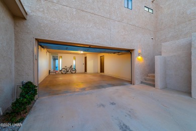 Enjoy panoramic views of the lake, golf course, and surrounding on London Bridge Golf Course in Arizona - for sale on GolfHomes.com, golf home, golf lot