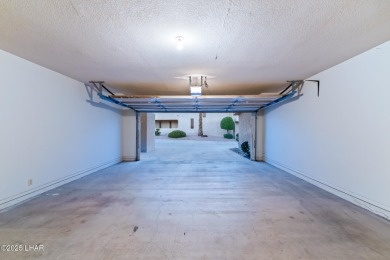 Enjoy panoramic views of the lake, golf course, and surrounding on London Bridge Golf Course in Arizona - for sale on GolfHomes.com, golf home, golf lot