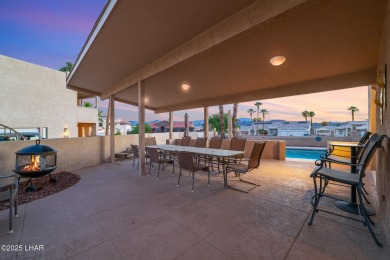Enjoy panoramic views of the lake, golf course, and surrounding on London Bridge Golf Course in Arizona - for sale on GolfHomes.com, golf home, golf lot