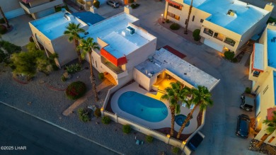 Enjoy panoramic views of the lake, golf course, and surrounding on London Bridge Golf Course in Arizona - for sale on GolfHomes.com, golf home, golf lot