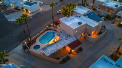 Enjoy panoramic views of the lake, golf course, and surrounding on London Bridge Golf Course in Arizona - for sale on GolfHomes.com, golf home, golf lot