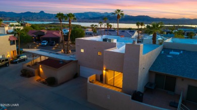 Enjoy panoramic views of the lake, golf course, and surrounding on London Bridge Golf Course in Arizona - for sale on GolfHomes.com, golf home, golf lot