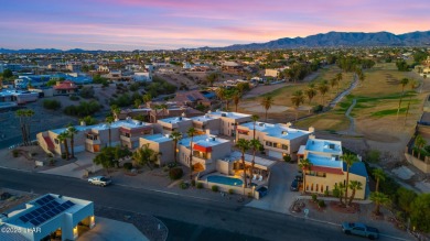 Enjoy panoramic views of the lake, golf course, and surrounding on London Bridge Golf Course in Arizona - for sale on GolfHomes.com, golf home, golf lot