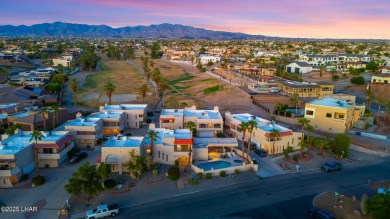 Enjoy panoramic views of the lake, golf course, and surrounding on London Bridge Golf Course in Arizona - for sale on GolfHomes.com, golf home, golf lot